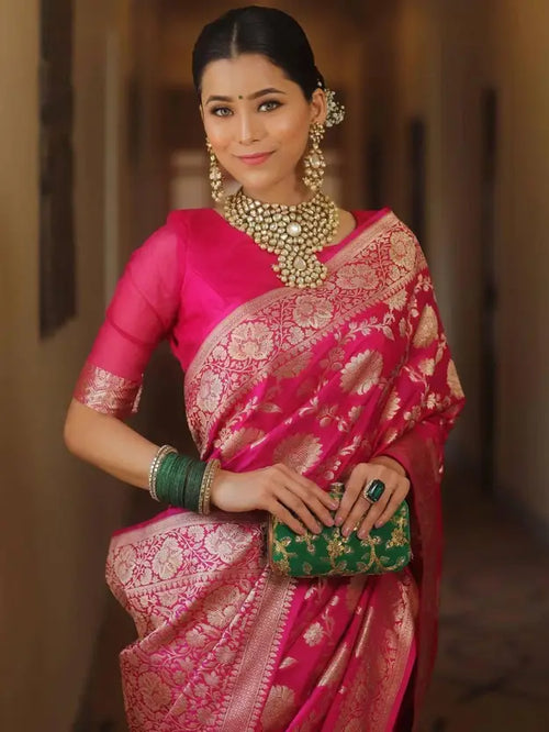 "Regal Pink Banarasi Silk Saree with Rich Zari Woven Motifs – Ideal for Weddings & Traditional Occasions"